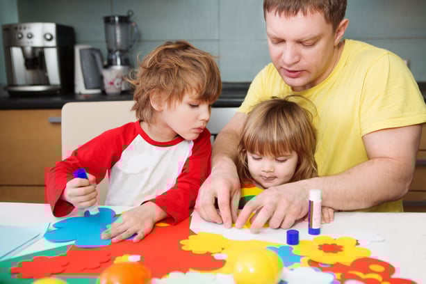 Father does crafts with children