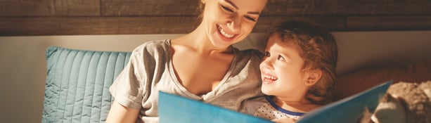 Mother,And,Child,Daughter,Reading,Book,In,Bed,Before,Going