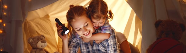 Reading,And,Family,Games,In,Children's,Tent.,Mother,And,Child