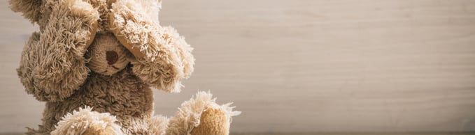 Child,Abuse,Concept.,Teddy,Bear,Covering,Eyes,In,An,Empty