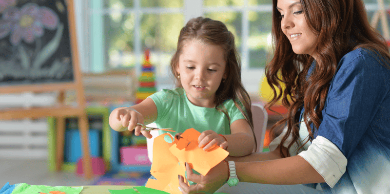 blog feature - mum and daugter paying with paper crafts