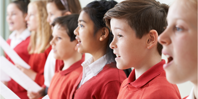 boy singing in choir